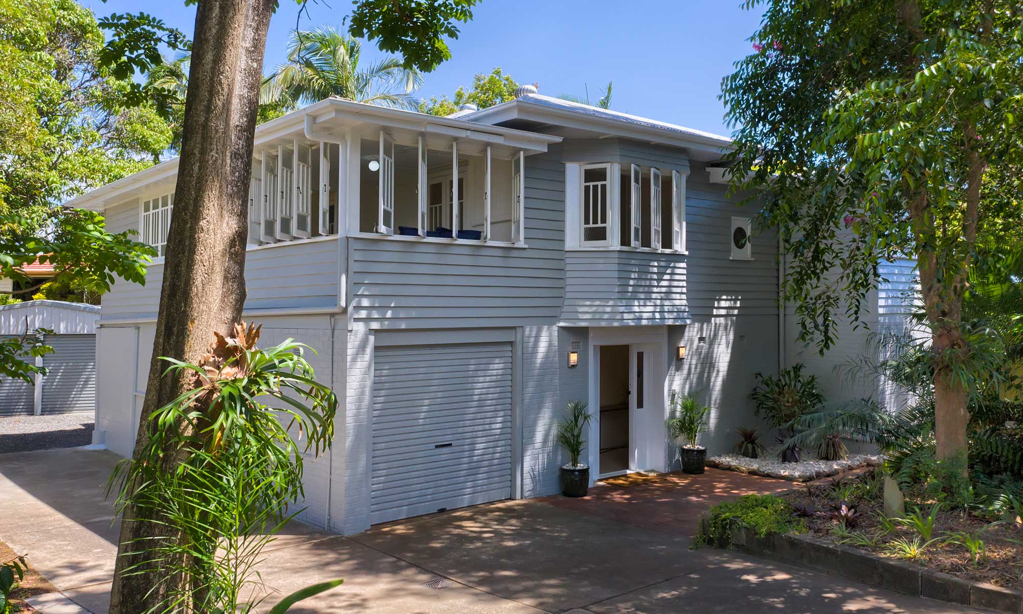  Sneaking  in between the palm trees at 4m above the ground to capture the front of 357 Manly Rd