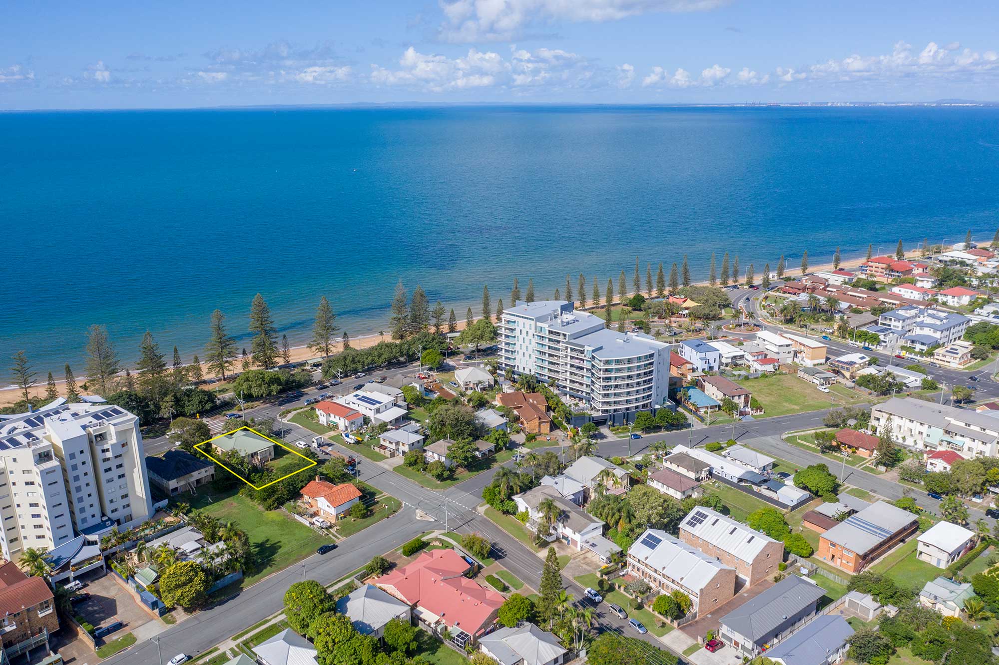 Looking south down the beach at 37 Marine Parade, Redcliffe