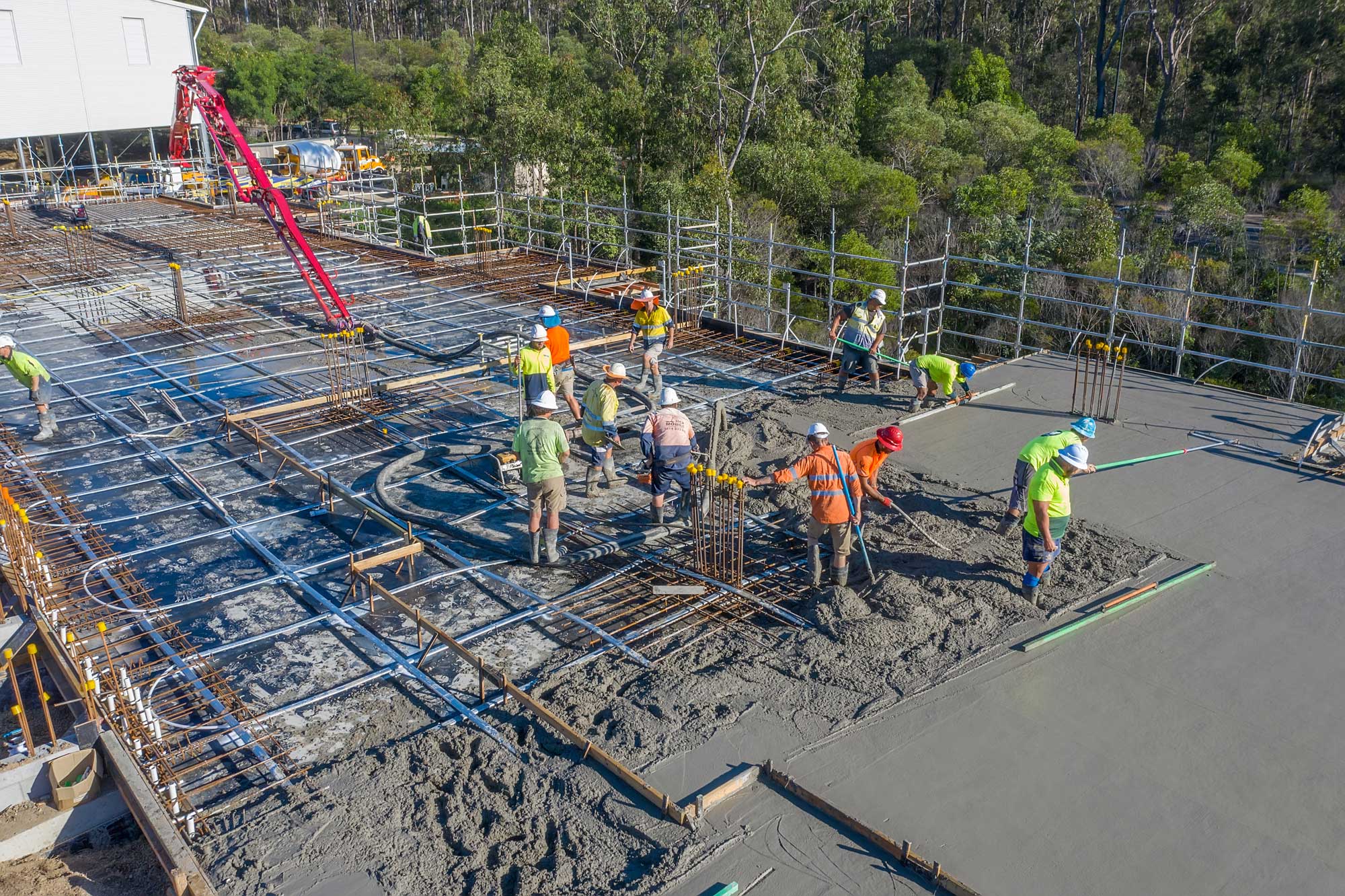 Using the Mavic2Pro drone to photograph construction site "works in progress"  - here the drone flies over the wet cement