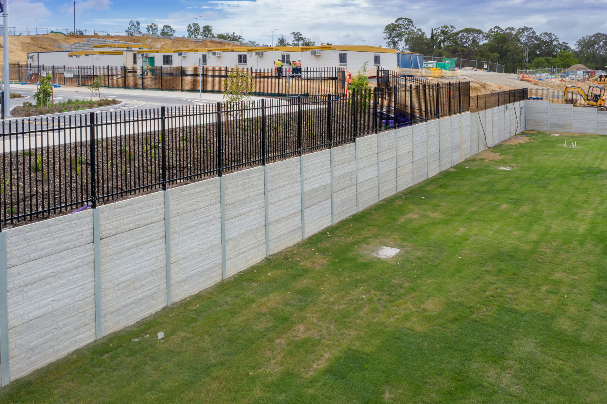 Drone photograph of a sleeper wall under construction at Coomera