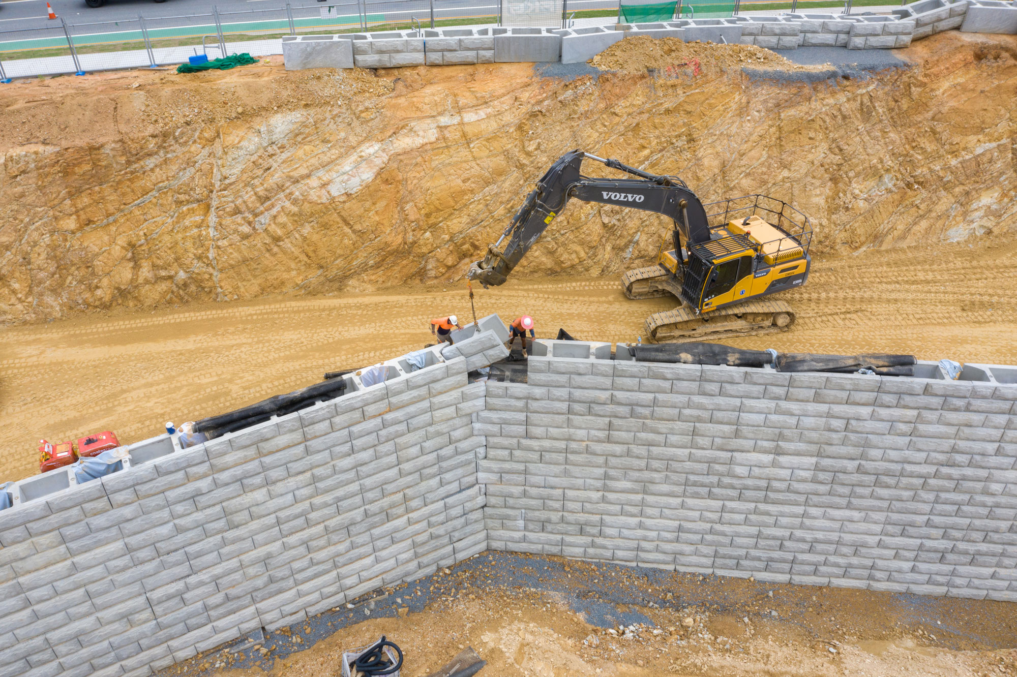 Drone photograph of a sleeper wall under construction at a state school under development at Coomera